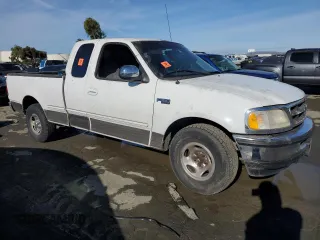 1997 Ford F-150 XL с VIN 1FTEX17L9VKB65855, выставлен на аукционе Copart как лот 87410414 с пробегом 198 005 миль миль и Списание • Salvage title. История ставок и продаж доступна на DreamBid. Изображение 4.