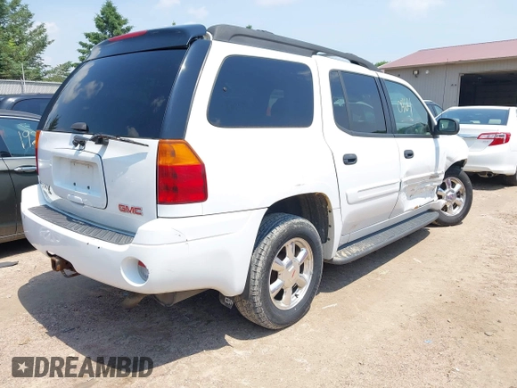 2004 GMC Envoy SLT with VIN 1GKET16S646135986, listed as a IAAI auction lot 42420464 with 132,741 mi miles and . Bid and sale history available at DreamBid. Image 4.