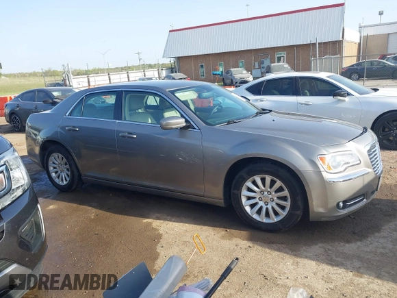 2014 Chrysler 300 with VIN 2C3CCAAG4EH159911, listed as a IAAI auction lot 41963042 with 105,972 mi miles and . Bid and sale history available at DreamBid. Image 13.
