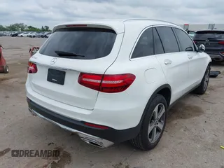 2019 Mercedes-Benz GLC 300 with VIN WDC0G4JB4KF590524, listed as a IAAI auction lot 42126657 with 53,841 mi miles and . Bid and sale history available at DreamBid. Image 4.