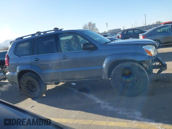 2005 Lexus GX 470 z VIN JTJBT20X650076884, wystawiony jako IAAI lot #41776915 z przebiegiem 219 091 mil mil oraz . Historia ofert i sprzedaży dostępna na DreamBid. Obrazek 14.