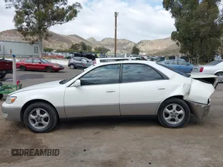 1997 Lexus ES 300 с VIN JT8BF22G2V0032810, выставлен на аукционе IAAI как лот 42130566 с пробегом 386 193 миль миль и . История ставок и продаж доступна на DreamBid. Изображение 14.
