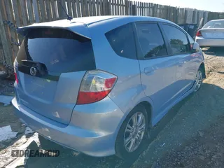 2009 Honda Fit Sport with VIN JHMGE88409S044540, listed as a IAAI auction lot 41933396 with 218,346 mi miles. Bid and sale history available at carsss.com. Image 4.