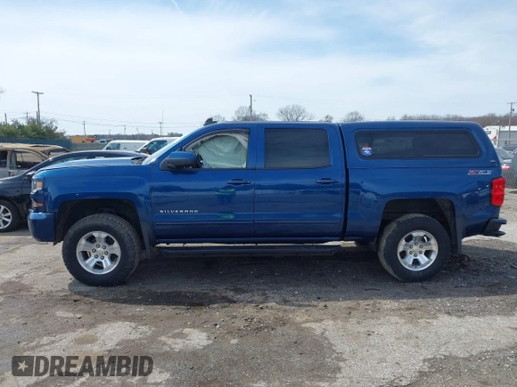 2017 Chevrolet Silverado 1500 LT with VIN 3GCUKREC5HG363503, listed as a IAAI auction lot 41833304 with 133,130 mi miles and . Bid and sale history available at DreamBid. Image 13.
