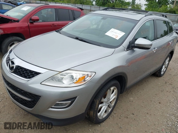 2012 Mazda CX-9 Grand Touring z VIN JM3TB3DA0C0337713, wystawiony jako IAAI lot #42368488 z przebiegiem 184 220 mil mil oraz . Historia ofert i sprzedaży dostępna na DreamBid. Obrazek 18.