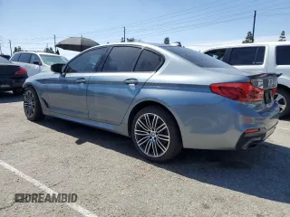 2020 BMW 5 Series 530e with VIN WBAJA9C06LCE66990, listed as a Copart auction lot 48823925 with 57,673 mi miles and Salvage Title. Bid and sale history available at DreamBid. Image 2.