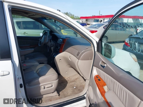 2009 Toyota Sienna XLE with VIN 5TDZK22C19S262107, listed as a IAAI auction lot 42158864 with 186,711 mi miles. Bid and sale history available at carsss.com. Image 5.