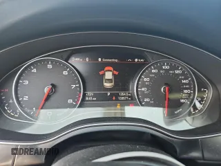 2014 Audi A6 Prestige with VIN WAUHGAFCXEN008586, listed as a Copart auction lot 60304815 with 133,577 mi miles and Salvage title. Bid and sale history available at DreamBid. Image 9.