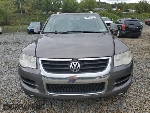 2010 Volkswagen Touareg VR6 with VIN WVGBF7A91AD001497, listed as a Copart auction lot 68234794 with 173,826 mi miles and Clean Title. Bid and sale history available at DreamBid. Image 5.