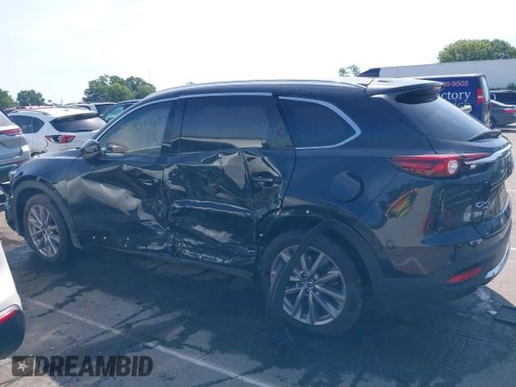 2021 Mazda CX-9 Carbon Edition with VIN JM3TCBDY3M0524241, listed as a IAAI auction lot 42538127 with 50,533 mi miles and . Bid and sale history available at DreamBid. Image 14.