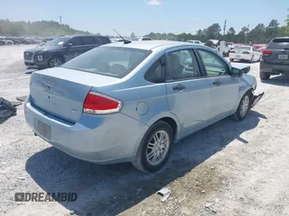 2009 Ford Focus SE with VIN 1FAHP35N19W232918, listed as a IAAI auction lot 42076066 with 165,953 mi miles. Bid and sale history available at carsss.com. Image 4.