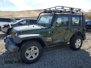 2009 Jeep Wrangler X with VIN 1J4FA24169L707695, listed as a Copart auction lot 49861955 with 89,807 mi miles and Salvage Title. Bid and sale history available at DreamBid. Image 1.