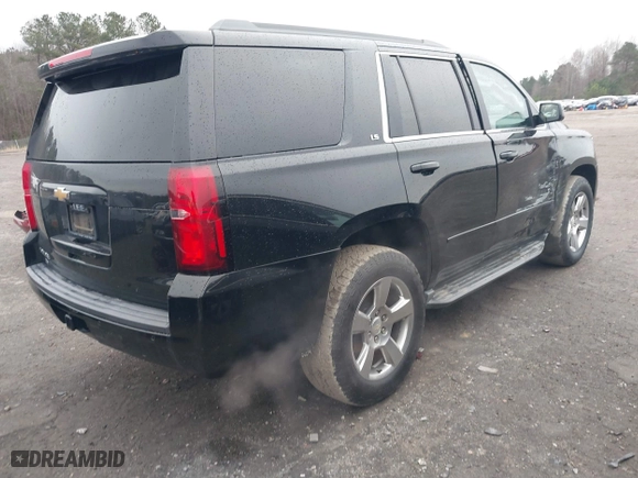 2016 Chevrolet Tahoe LS with VIN 1GNSKAKCXGR458352, listed as a IAAI auction lot 41541099 with 93,879 mi miles. Bid and sale history available at carsss.com. Image 4.