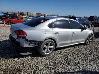 2012 Volkswagen Passat SE with VIN 1VWBP7A34CC045562, listed as a Copart auction lot 48710615 with 165,492 mi miles and Salvage Title. Bid and sale history available at carsss.com. Image 3.