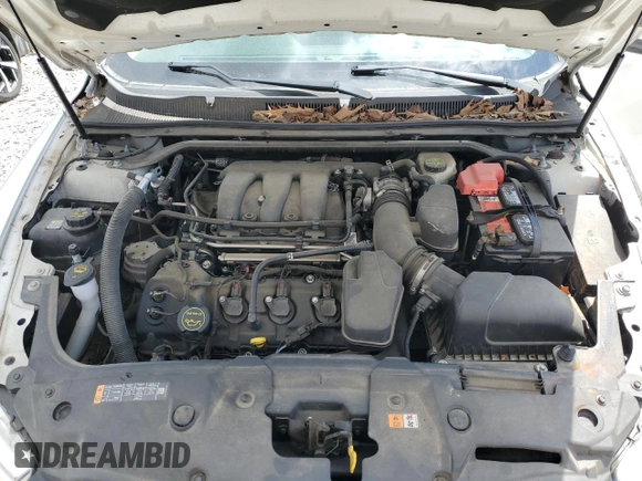 2014 Ford Taurus SEL with VIN 1FAHP2E82EG139480, listed as a Copart auction lot 52765215 with 114,600 mi miles and Salvage Title. Bid and sale history available at carsss.com. Image 11.