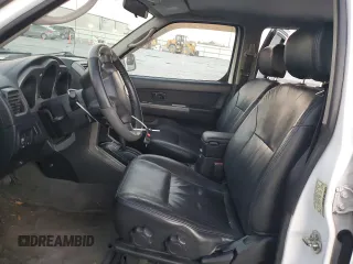 2004 Nissan Frontier LE with VIN 1N6ED27T14C451784, listed as a Copart auction lot 83341854 with 137,982 mi miles and Salvage title. Bid and sale history available at DreamBid. Image 7.