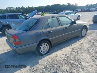 1997 Mercedes-Benz C with VIN WDBHA28E7VA496104, listed as a IAAI auction lot 42773052 with 258,692 mi miles and . Bid and sale history available at DreamBid. Image 4.