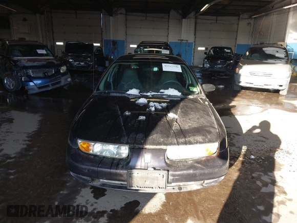2000 Saturn SL with VIN 1G8ZH5282YZ214070, listed as a IAAI auction lot 41537546 with 94,319 mi miles. Bid and sale history available at carsss.com. Image 6.