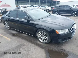 2015 Audi A8 4.0T with VIN WAU32AFD9FN023826, listed as a IAAI auction lot 42353372 with 94,833 mi miles and . Bid and sale history available at DreamBid. Image 1.