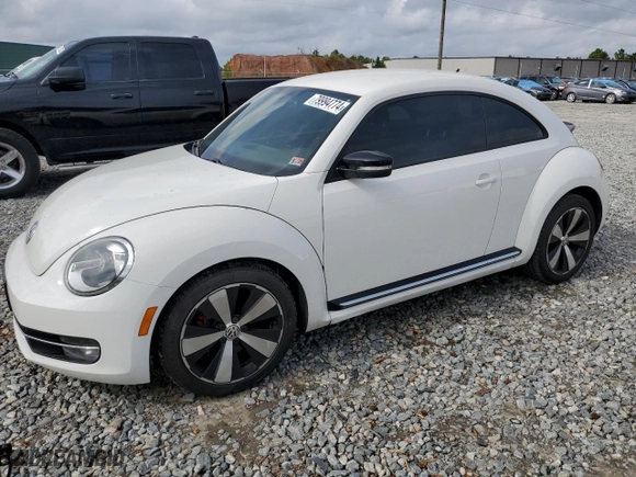 2012 Volkswagen Beetle 2.0T Turbo w/Sun/Sound PZEV with VIN 3VWVA7AT2CM619430, listed as a Copart auction lot 79994774 with 133,927 mi miles and Clean Title. Bid and sale history available at carsss.com. Image 1.
