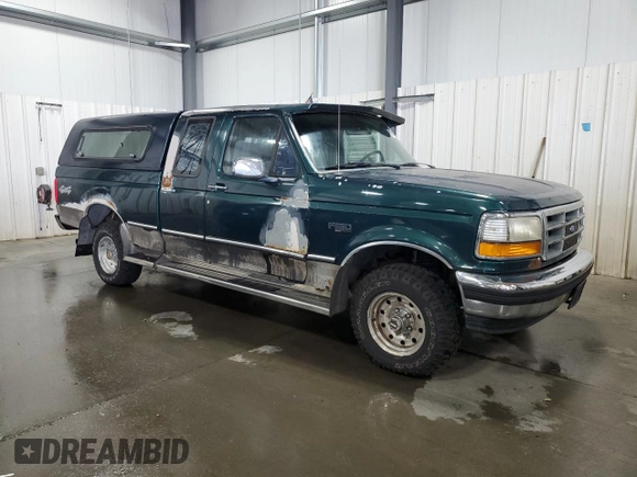 1994 Ford F-150 with VIN 1FTEX14N3RKB07414, listed as a Copart auction lot 70826944 with 130,998 mi miles and Salvage Title. Bid and sale history available at carsss.com. Image 4.