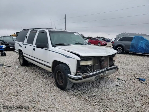 1996 GMC Suburban with VIN 1GDEC16R1TJ741423, listed as a Copart auction lot 83225074 with 488,815 mi miles and Salvage Title. Bid and sale history available at carsss.com. Image 12.