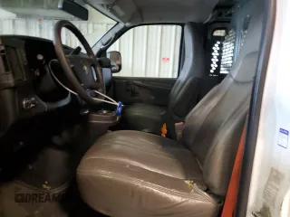 2014 Chevrolet Express Cargo Van with VIN 1GCWGFCB5E1130248, listed as a Copart auction lot 45773125 with 140,728 mi miles and Clean Title. Bid and sale history available at carsss.com. Image 7.
