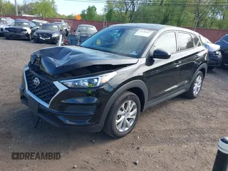 2019 Hyundai Tucson SE z VIN KM8J2CA4XKU042622, wystawiony jako IAAI lot #42146467 z przebiegiem 37 241 mil mil oraz . Historia ofert i sprzedaży dostępna na DreamBid. Obrazek 2.