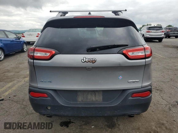 2014 Jeep Cherokee Latitude z VIN 1C4PJMCS8EW286152, wystawiony jako Copart lot #60332475 z przebiegiem 102 434 mil mil oraz Szkoda całkowita • Salvage title. Historia ofert i sprzedaży dostępna na DreamBid. Obrazek 6.
