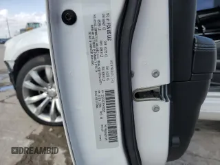 2015 Chrysler 300 C with VIN 2C3CCAET3FH739529, listed as a Copart auction lot 47520495 with 151,096 mi miles and Salvage Title. Bid and sale history available at DreamBid. Image 12.