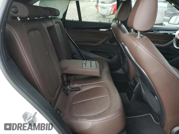 2021 BMW X1 xDrive28i z VIN WBXJG9C02M5S69998, wystawiony jako Copart lot #54782065 z przebiegiem 48 211 mil mil oraz Szkoda całkowita • Salvage title. Historia ofert i sprzedaży dostępna na DreamBid. Obrazek 11.