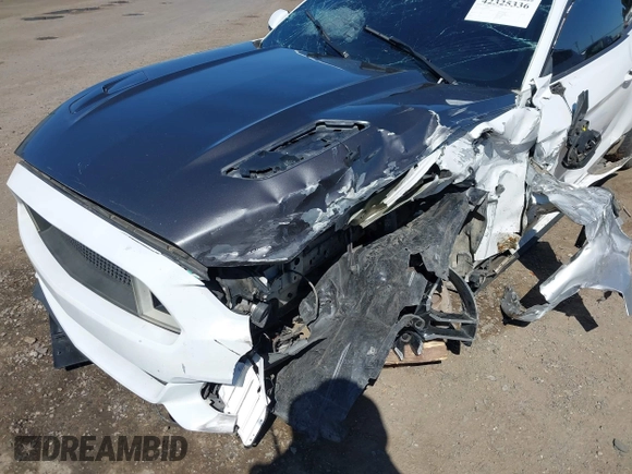 2016 Ford Mustang EcoBoost z VIN 1FA6P8TH3G5221133, wystawiony jako IAAI lot #42325336 z przebiegiem 135 065 mil mil oraz . Historia ofert i sprzedaży dostępna na DreamBid. Obrazek 18.