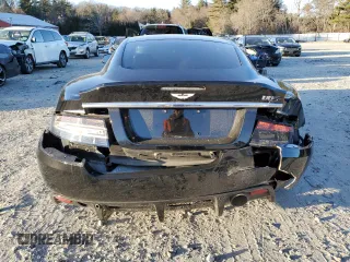 2012 Aston Martin DBS z VIN SCFFBCBD0CGE03238, wystawiony jako Copart lot #87450334 z przebiegiem 89 666 mil mil oraz Tytuł czysty. Historia ofert i sprzedaży dostępna na DreamBid. Obrazek 6.