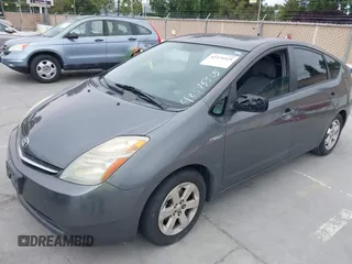 2007 Toyota Prius z VIN JTDKB20U573236900, wystawiony jako IAAI lot #42375325 z przebiegiem Nie podano mil oraz . Historia ofert i sprzedaży dostępna na DreamBid. Obrazek 6.