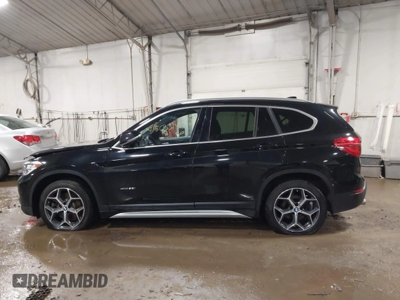 2018 BMW X1 xDrive28i with VIN WBXHT3C30J5K29383, listed as a IAAI auction lot 41503314 with 107,678 mi miles. Bid and sale history available at carsss.com. Image 14.