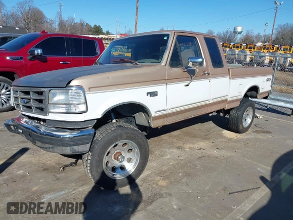1996 Ford F-150 with VIN 1FTEX14N4TKA28292, listed as a IAAI auction lot 41422154 with 173,728 mi miles. Bid and sale history available at carsss.com. Image 2.