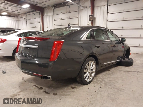 2013 Cadillac XTS Luxury with VIN 2G61R5S32D9101909, listed as a IAAI auction lot 41461611 with 110,603 mi miles. Bid and sale history available at carsss.com. Image 4.
