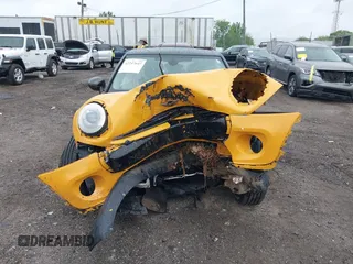 2015 MINI Hardtop 4 Door z VIN WMWXS5C54FT833253, wystawiony jako IAAI lot #42247647 z przebiegiem Nie podano mil oraz . Historia ofert i sprzedaży dostępna na DreamBid. Obrazek 6.