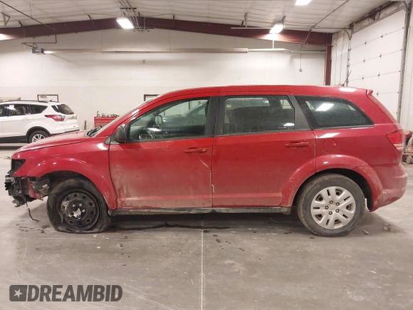 2015 Dodge Journey American Value z VIN 3C4PDCAB5FT720300, wystawiony jako IAAI lot #42074690 z przebiegiem 144 690 mil mil oraz . Historia ofert i sprzedaży dostępna na DreamBid. Obrazek 14.