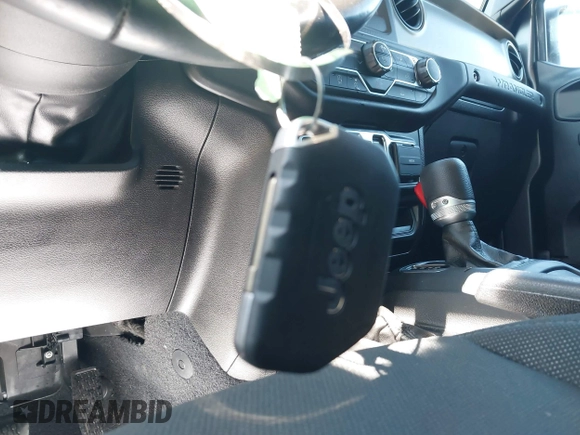 2022 Jeep Wrangler Unlimited Willys with VIN 1C4HJXDN1NW144112, listed as a IAAI auction lot 41867571 with 63,876 mi miles and . Bid and sale history available at DreamBid. Image 11.