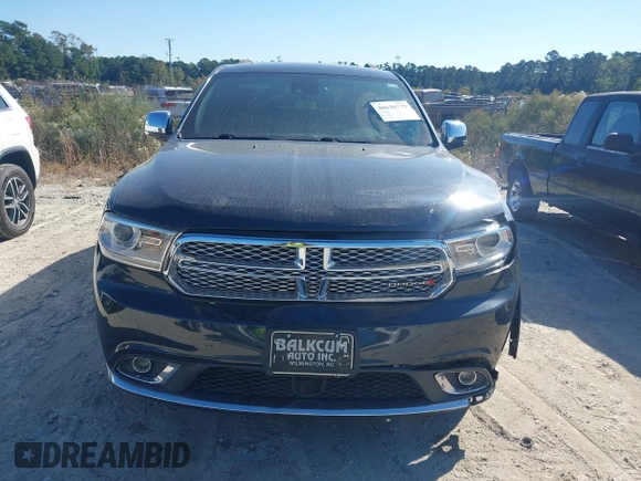 2014 Dodge Durango Citadel with VIN 1C4SDJETXEC390326, listed as a IAAI auction lot 40620779 with 119,537 mi miles and . Bid and sale history available at DreamBid. Image 12.