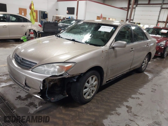 2003 Toyota Camry LE with VIN 4T1BE32K73U136399, listed as a IAAI auction lot 41877554 with 235,078 mi miles and . Bid and sale history available at DreamBid. Image 2.