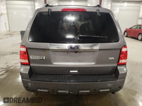 2010 Ford Escape Limited с VIN 1FMCU9EG6AKA55615, выставлен на аукционе Copart как лот 55403005 с пробегом 224 880 миль миль и Списание • Salvage title. История ставок и продаж доступна на DreamBid. Изображение 6.