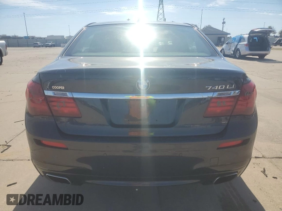 2014 BMW 7 Series 740Li with VIN WBAYE4C59ED138376, listed as a Copart auction lot 76878354 with 73,129 mi miles and Salvage Title. Bid and sale history available at carsss.com. Image 6.