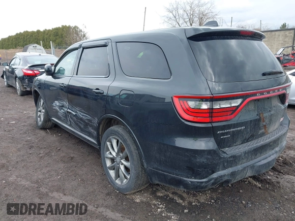 2015 Dodge Durango SXT with VIN 1C4RDJAG2FC101402, listed as a IAAI auction lot 41864200 with 191,667 mi miles and . Bid and sale history available at carsss.com. Image 3.