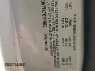2007 Cadillac DTS V8 z VIN 1G6KD57YX7U201089, wystawiony jako Copart lot #44665825 z przebiegiem 117 048 mil mil oraz Szkoda całkowita • Salvage title. Historia ofert i sprzedaży dostępna na DreamBid. Obrazek 12.