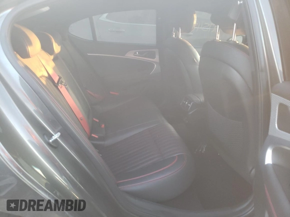2023 Genesis G70 2.0T with VIN KMTG34TA4PU104352, listed as a Copart auction lot 76000484 with 27,548 mi miles and Salvage Title. Bid and sale history available at DreamBid. Image 11.