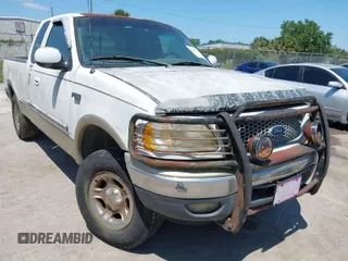 1999 Ford F-150 XL with VIN 2FTRX18L8XCB22793, listed as a IAAI auction lot 42016740 with 198,056 mi miles. Bid and sale history available at carsss.com. Image 1.
