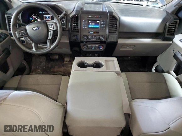 2015 Ford F-150 XLT with VIN 1FTEW1EP2FFC73690, listed as a Copart auction lot 61154355 with 145,389 mi miles and Salvage title. Bid and sale history available at DreamBid. Image 8.