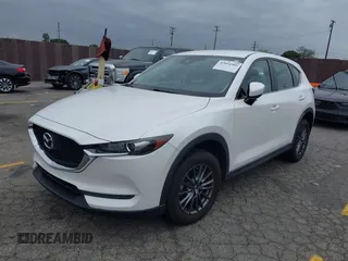 2019 Mazda CX-5 Sport with VIN JM3KFABM4K1565787, listed as a IAAI auction lot 42054585 with 80,580 mi miles and . Bid and sale history available at DreamBid. Image 2.